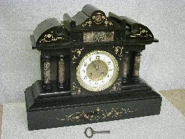 restaurované mramorové hodiny